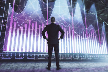 Businessman and forex graph hologram. Double exposure. Concept of financial education and analysis