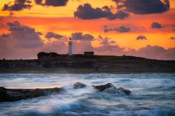 Paphos Lighthouse on a sunrise in winter day in Paphos, Cyprus