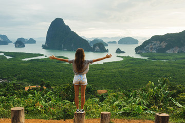 Young woman looking at the beautiful landscape
