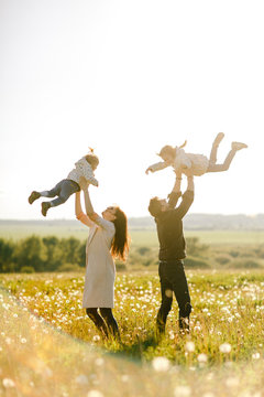 Happy family daughter hugs his dad on holiday