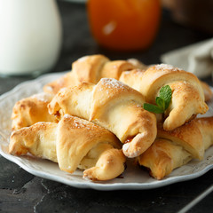 Homemade croissants or sweet rolls with jam