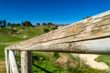 Fototapeta na wymiar Golf at La Cala de Mijas, Spain on a sunny day with green grass and beautiful landscape.
