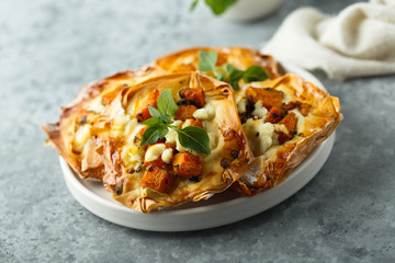 Pumpkin cheese tarts with basil
