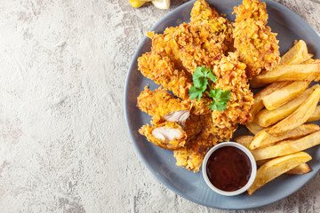 Chicken strips in cornflakes breadcrumb