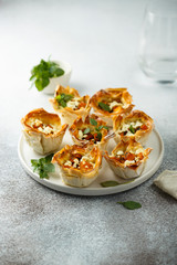 Pumpkin cheese tarts with basil