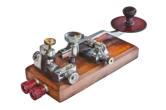 Ancient morse code telegraphy device isolated on whit