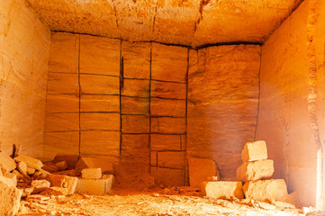 Dead end in underground catacombs. Mining construction shell rock. Underground excavation of...