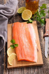 raw salmon fillet with herb and lemon