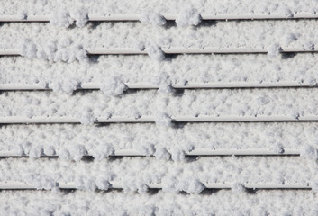 detail of hoar frost or ice on weather station wall