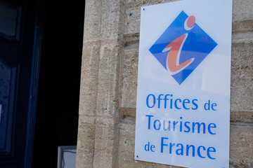 office de tourisme French tourism office sign on wall building in France