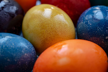 Eggs that found a rabbit at Easter of different colors in a vase.