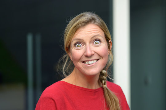 Cute Woman Looking Wide Eyed At The Camera