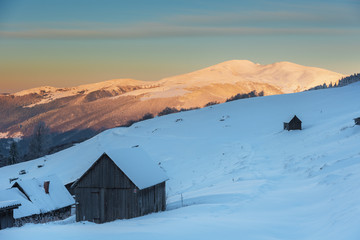 Beautiful pink morning in winter mountains