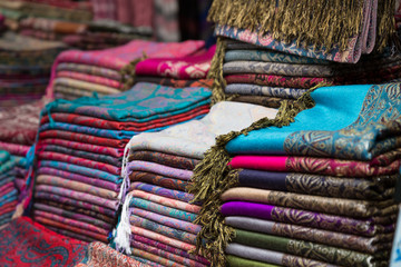 Rugs in the shop of a merchant in the souk of the medina of Fes in Morocco