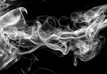 movement of fire design on black background. white smoke on dark