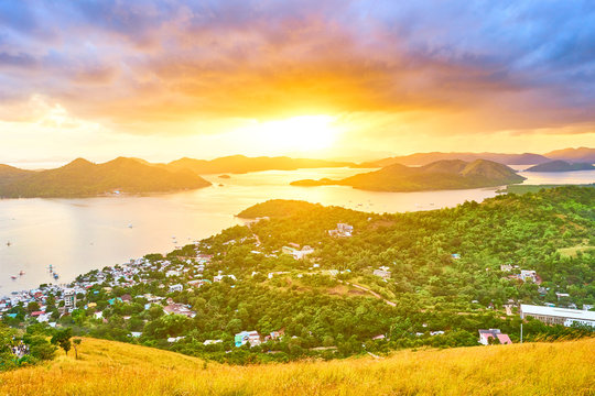 View from Mount Tapyas on Coron Island - North Palawan, Philippines. Looking over Coron Town and Bay at Sunset.