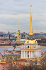 St. Petersburg, Russia - May, 06, 2018: View of the spiers of the Admiralty and the Peter and Paul Fortress from the roof of St. Isaac's Cathedral in St. Petersburg.