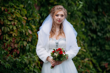 Young beautiful bride in a wedding dress