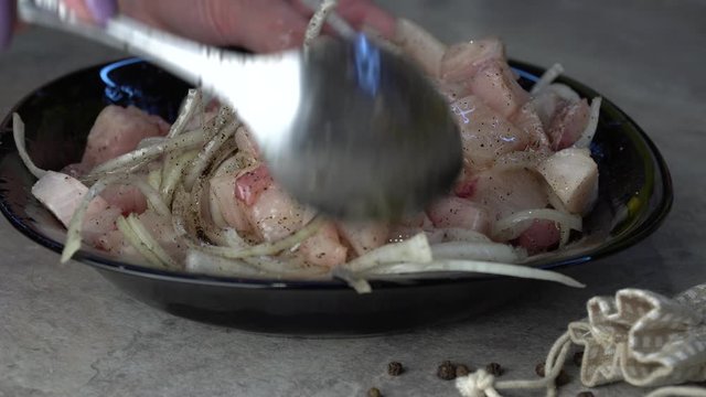 a dish of frozen fish, cut into small pieces