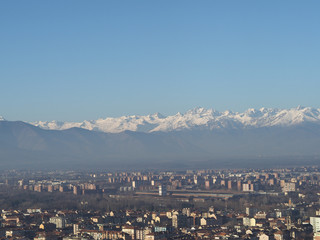 Aerial view of Turin with Alps mountains