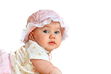 Cute smiling happy baby in the bedroom.