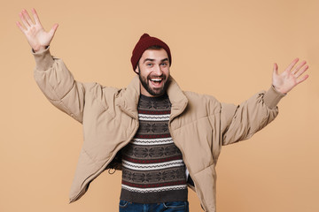 Portrait of a happy young bearded man