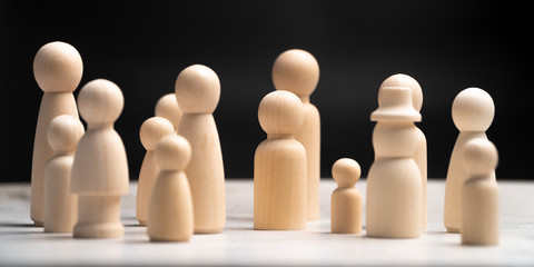 Many wooden human figures, Man and woman standing. Concept of Human resource, Talent management, Recruitment employee