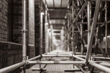 illuminated scaffolding at night, steel, abstract, no workers, nice scaffolding at night, black and white photo