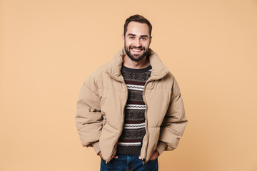 Portrait of a happy young bearded man