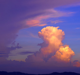 Beautiful tropical clouds lighted by sunset light.