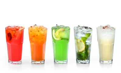 Summer cocktails, cold, refreshing, bright, icy, juicy, side view, somewhat, with mint, lemon, coffee, raspberries, strawberries, lime, raspberries, cherries, pina colada, raff, ice in glass. Isolate