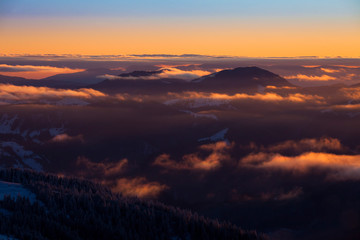 Obraz premium winter sunset in the Ceahlau mountains. Romania