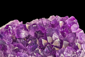 large bright color amethyst crystals on black