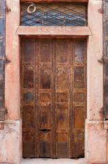Fototapeta na wymiar Old brown iron door style.