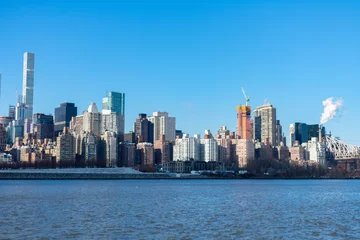 Foto op Plexiglas Midtown Manhattan Skyline along the East River in New York City with the Queensboro Bridge © James