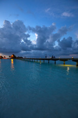 Footbridge of Paradise Island (Lankanfinolhu) at dusk, Maldives