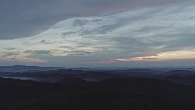Aerial view of Beskid Mountains (Beskidy), mountain ranges in the Carpathians, at sunset. Wide angle view. Southern Poland, Europe.