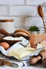 Modern kitchen. Cooking process. Baking ingredients: flour, butter, eggs, spices.