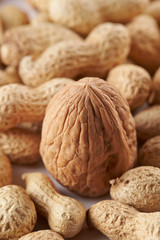 Heap of walnuts and peanuts background