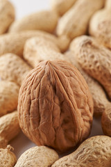 Heap of walnuts and peanuts background