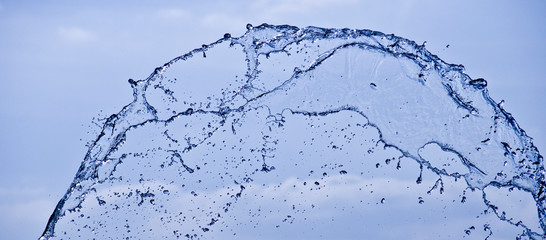 water splash isolated on blue background