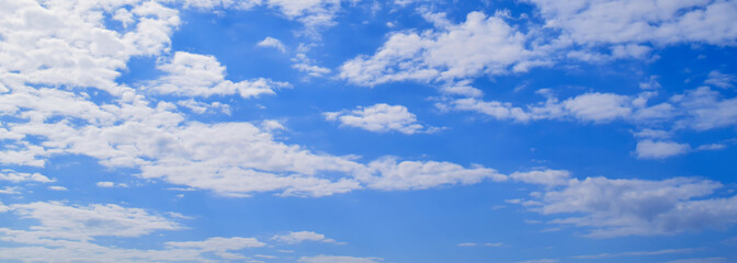 Naklejka na ściany i meble White clouds with a beautiful blue background