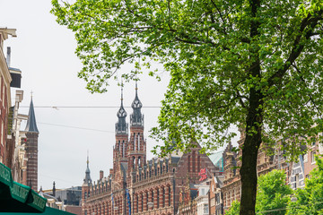 Fototapeta premium Amsterdam, Netherlands - May 23, 2018 : Beautiful street view of Traditional old buildings in Amsterdam,Netherlands