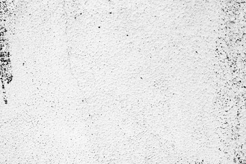 Texture of a concrete wall with cracks and scratches which can be used as a background