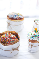 Easter cakes on a white wooden background