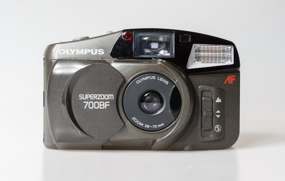 london, england, 05/05/2019  a retro vintage 1990s olympus superzoom 700bf camera isolated on a white background. primitive digital photography camera. early digital cameras.