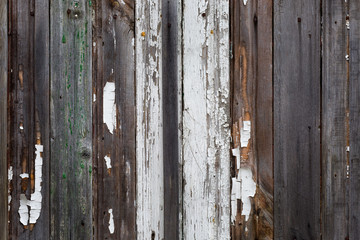 Old wooden planks with peeling paint. Background. Texture