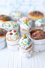 Easter cakes on a white wooden background