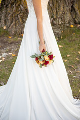 Détail de la robe de la mariée le jour du mariage