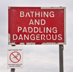 Warning and prohibition signs found along the beach at Hayling Island Hampshire UK